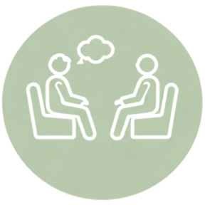 Ícone de terapeuta em sessão com um adulto, ambos sentados frente a frente, com balão de pensamento, em fundo circular verde.